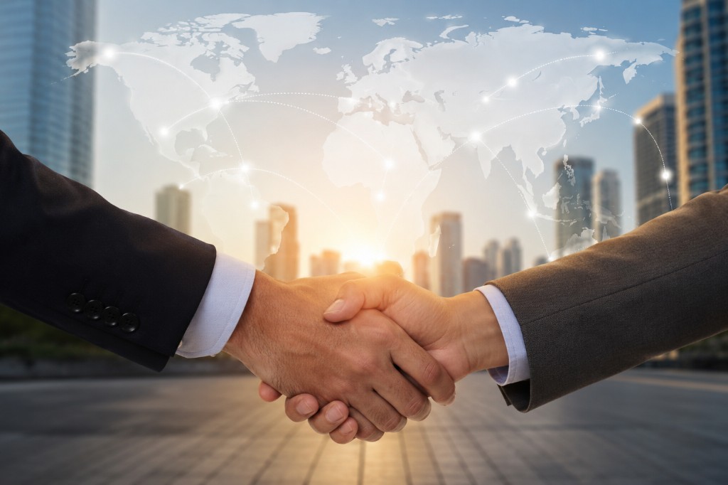 Business handshake with global network
